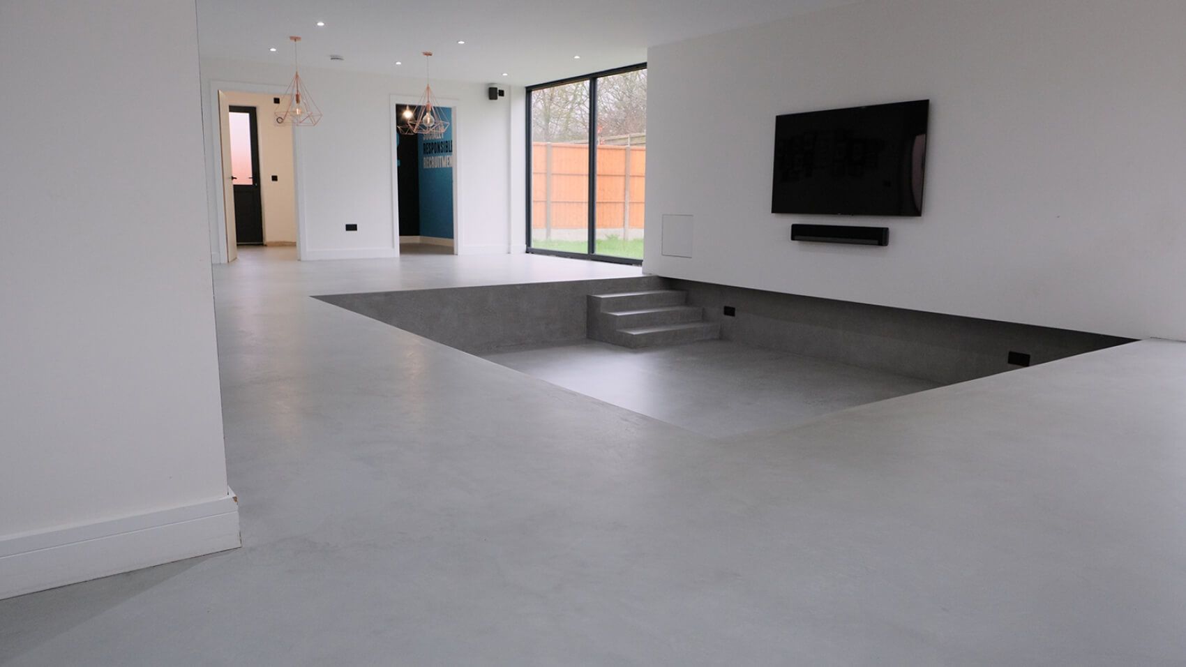 Salón acabado en microcemento